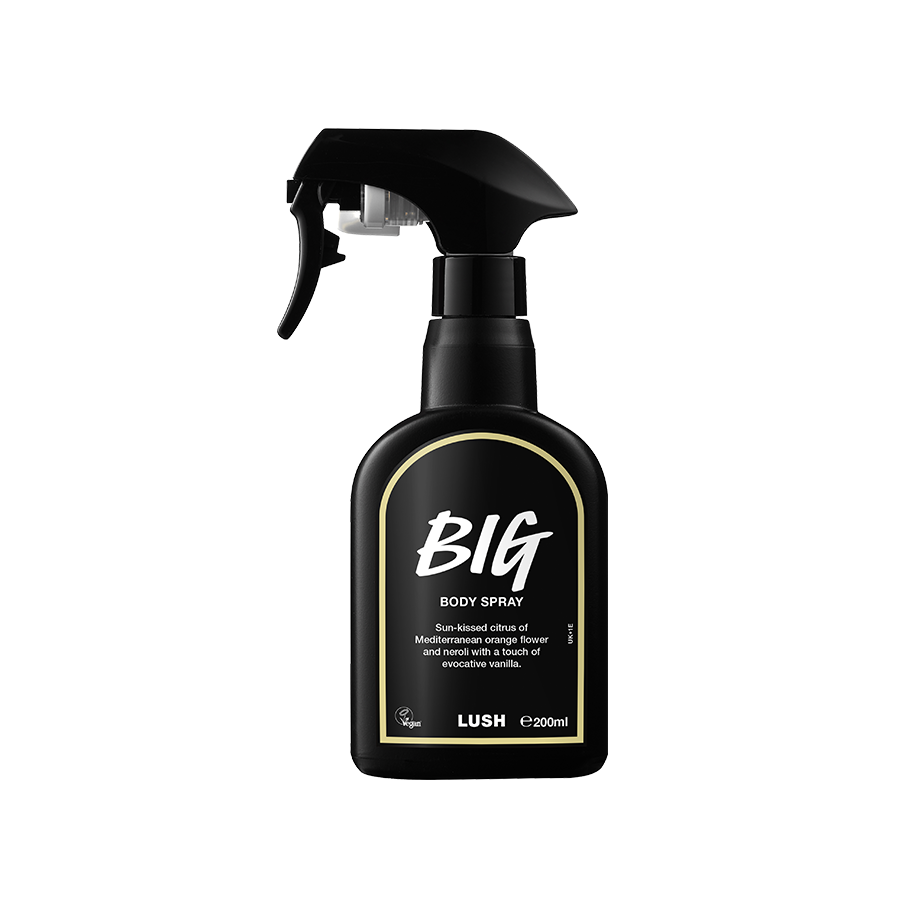 Big body spray. A black spray bottle of Lush "Big" Body Spray. The product label is black with a pale yellow banded border. White text states the product name and the scent description.